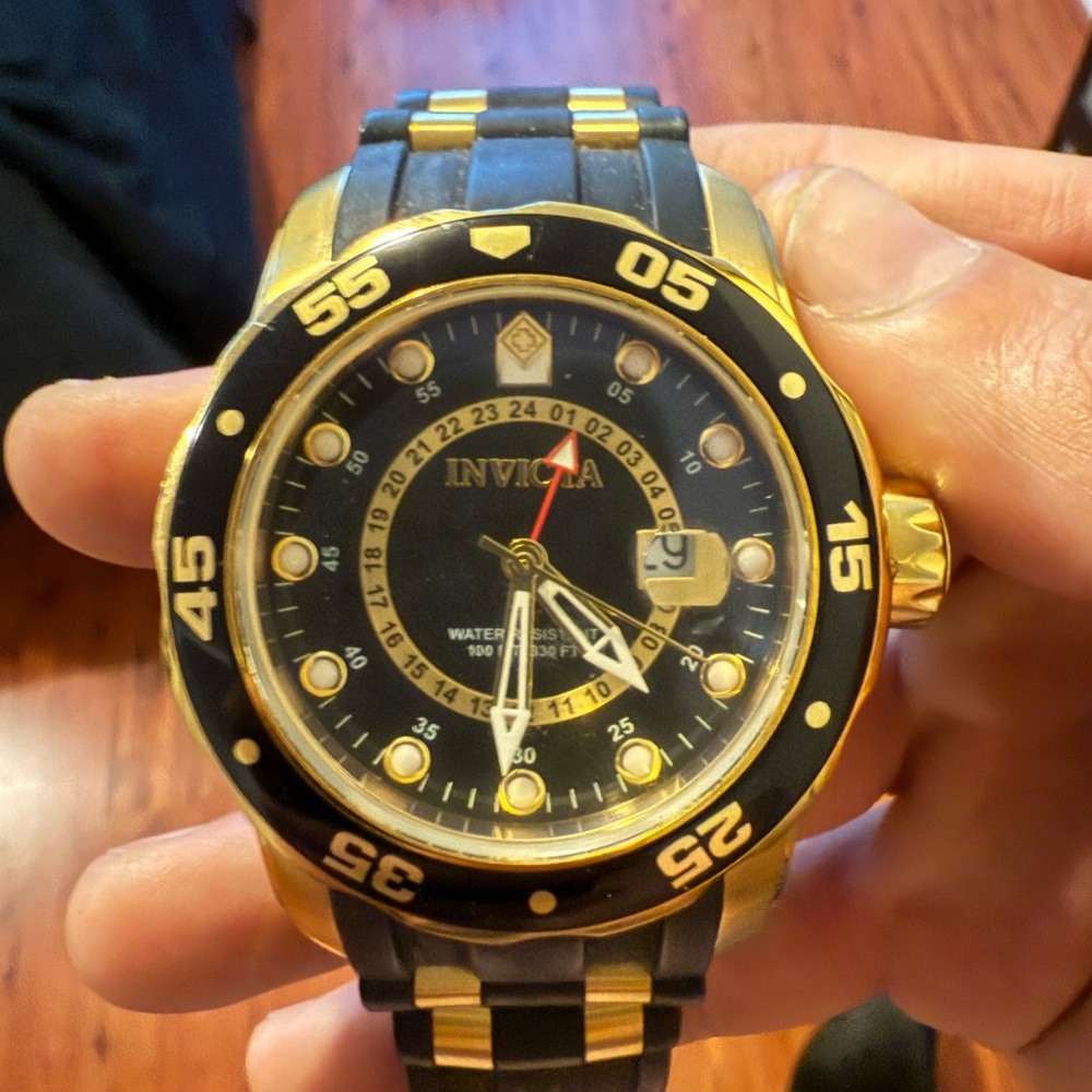 Invicta Pro Diver 6991 Black and Gold Watch